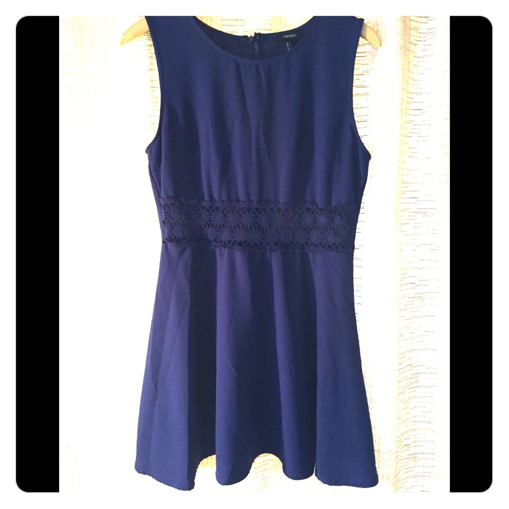Navy blue dress with flowered design waist